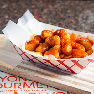 BG CHICKEN BITES DOUSED IN HRLDS MILD SAUCE